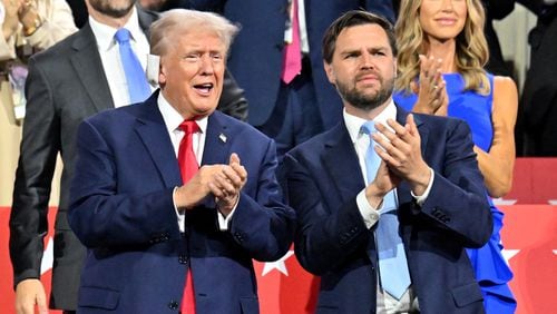 Former President Donald Trump with Sen. JD Vance (R-Ohio) make appearance during the Republican National Convention at the Fiserv Forumduring the first day of the Republican National Convention, Monday, July 15, 2024, in downtown Milwaukee, WI. (Hyosub Shin / AJC)