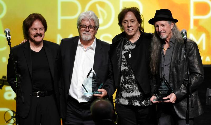FILE - Tom Johnston, from left, Michael McDonald, John McFee and Pat Simmons of the Doobie Brothers appear with the ASCAP Voice of Music Award at the 32nd Annual ASCAP Pop Music Awards in Los Angeles on April 29, 2015. McDonald has a new memoir titled "What a Fool Believes." (Photo by Chris Pizzello/Invision/AP, File)