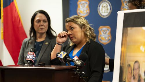 Kailyn Kaiser, granddaughter of Maryanne Humphrey, speaks at a GBI news conference Tuesday.