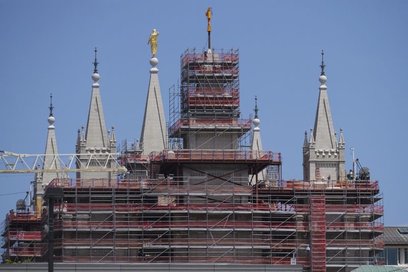 A view of the ongoing Temple Square renovation project, showing the Salt Lake Temple enveloped in scaffolding, is seen on June 17, 2024, in Salt Lake City. (AP Photo/Rick Bowmer)