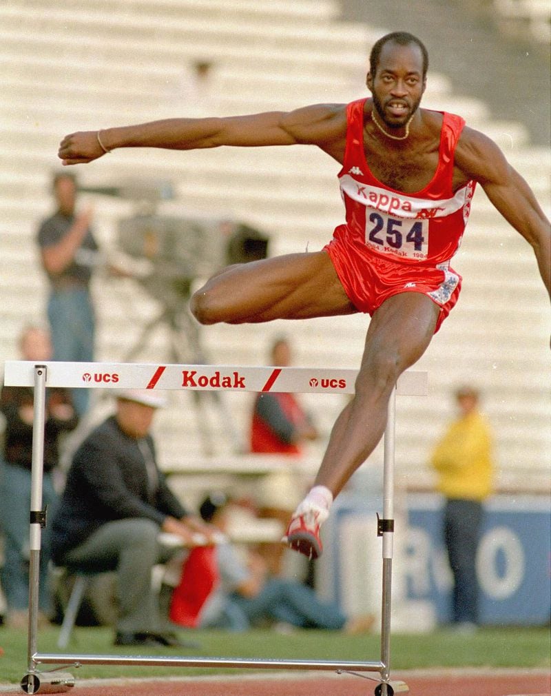 FILE--Edwin Moses clears the first hurdle in the Men's 400-meter on his way to winning the event and a place on the U.S. Olympic Team during the U.S. Track and Field Trials in Los Angeles in this June 19, 1984 photo. Moses was voted 66th of the top 100 athletes of the century by a selected panel assembled by The Associated Press. (AP Photo/Lennox McLendon)