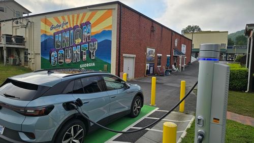 A Volkswagen ID.4 electric car using a public charging station in the municipal parking lot in Blairsville, Ga., Sept. 7, 2024. (Credit: Chris Hardesty)