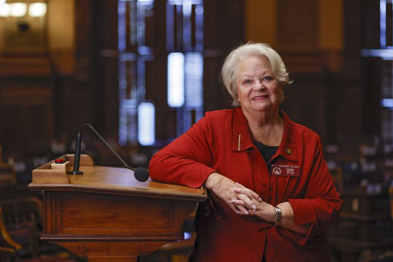Rep. Mary Margaret Oliver, a co-sponsor of the mental health parity bill that was passed by the legislature, is photographed in the House chamber in the Georgia Capitol in Atlanta on Wednesday, September 21, 2022.   (Bob Andres for the Atlanta Journal Constitution)