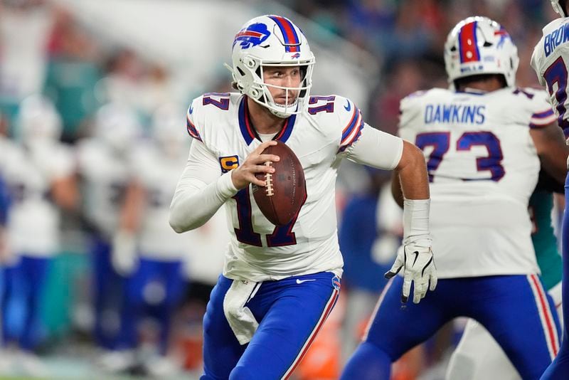 Buffalo Bills quarterback Josh Allen (17) looks to pass the ball during the first half of an NFL football game against the Miami Dolphins, Thursday, Sept. 12, 2024, in Miami Gardens, Fla. (AP Photo/Rebecca Blackwell)