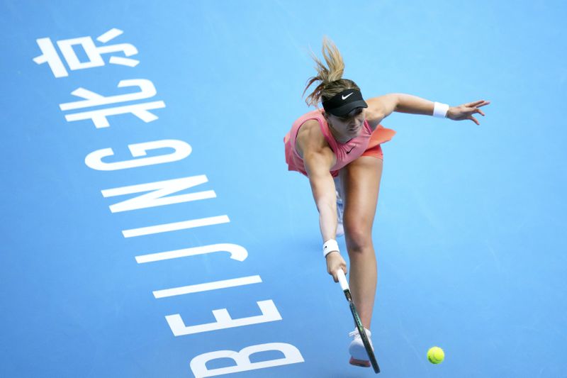 Paula Badosa of Spainreturns a shot to Coco Gauff of the United States in a women's singles semi-final match for the China Open tennis tournament at the National Tennis Center in Beijing, Saturday, Oct. 5, 2024. Saturday, Oct. 5, 2024. (AP Photo/Achmad Ibrahim)