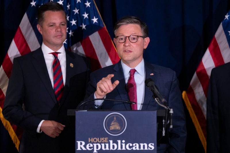 The government funding plan of U.S. House Speaker Mike Johnson (right) was voted down on Wednesday.