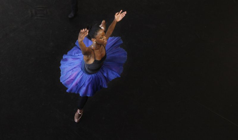 FILE - In this Tuesday, July 10, 2012 photo, dancer Michaela DePrince rehearses for her lead role in Le Corsaire in Johannesburg. (AP Photo Denis Farrell, File)