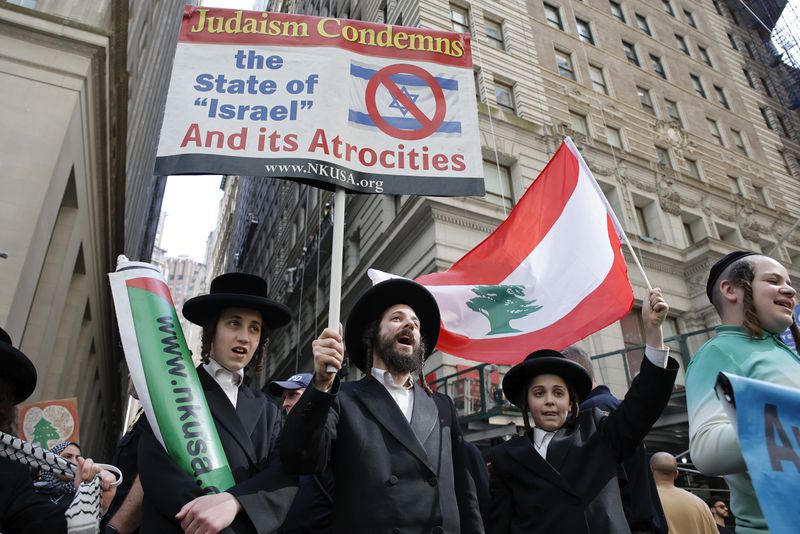 Pro-Palestinian Orthodox Jews demonstrate during a protest, Monday, Oct. 7, 2024, in New York. (AP Photo/Stefan Jeremiah)