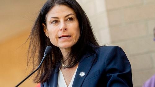 FILE - Michigan Attorney General Dana Nessel speaks during a news conference Sept. 19, 2022, outside of the Genesee County Sheriff's Office in Flint, Mich. (Jake May/The Flint Journal via AP, File)