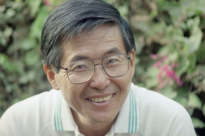 FILE - Peruvian presidential candidate Alberto Fujimori poses for a photo, April 8, 1990. (AP Photo/Fred Savariau, File)