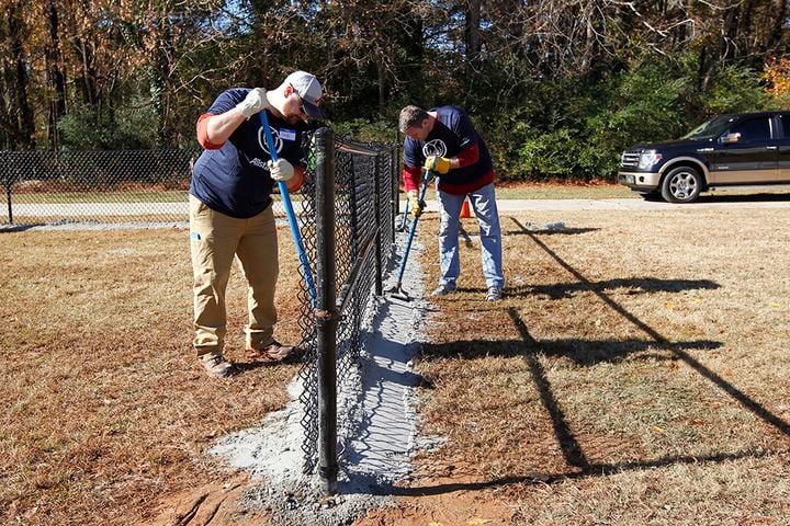 SEC stars build football field in DeKalb