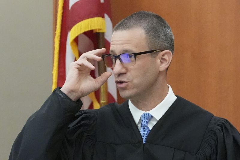 Utah state Judge Richard Mrazik looks on during a hearing for Kouri Richins, a Utah mother of three who wrote a children's book about coping with grief after her husband's death and was later accused of fatally poisoning him Tuesday, Aug. 27, 2024, in Park City, Utah. (AP Photo/Rick Bowmer, Pool)