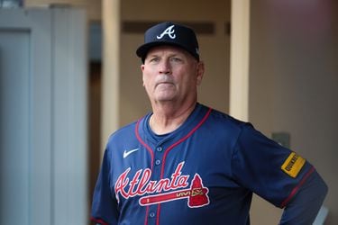 Atlanta Braves manager Brian Snitker (43) watches from the dugout before National League Division Series Wild Card Game Two against the San Diego Padres at Petco Park in San Diego on Wednesday, Oct. 2, 2024.   (Jason Getz / Jason.Getz@ajc.com)