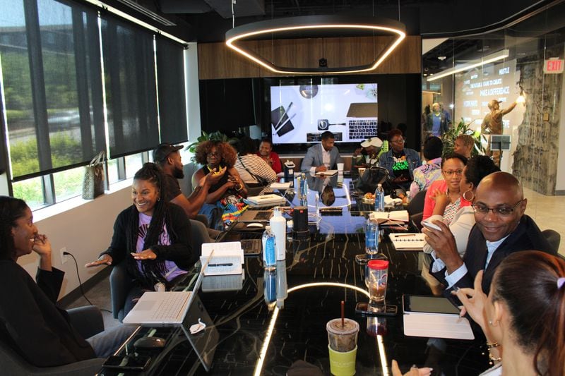 Black business owners gather at the Russell Innovation Center for Entrepreneurs to collaborate and share their experiences in the business industry. The center offers coaching circles for small groups of individuals wanting to support each other’s personal and professional development. (Photo/Adrian Shelby)