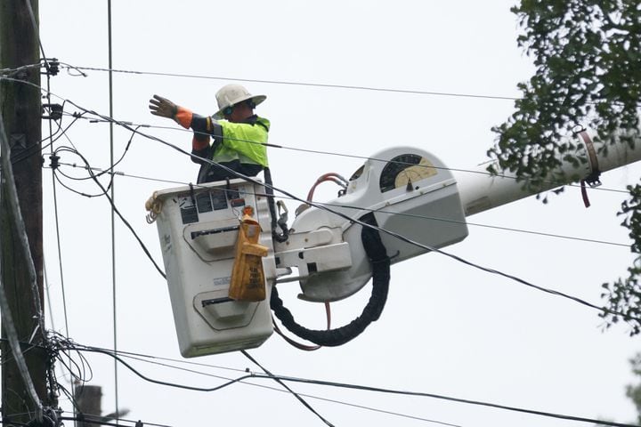 Georgia Power crews are seen restoring power in the northside neighborhood in Valdosta, where dozens of fallen trees have cut power near Valdosta State University. This shows the aftermath of Tropical Storm Debby’s path through South Georgia on Monday, August 5, 2024.
(Miguel Martinez / AJC)