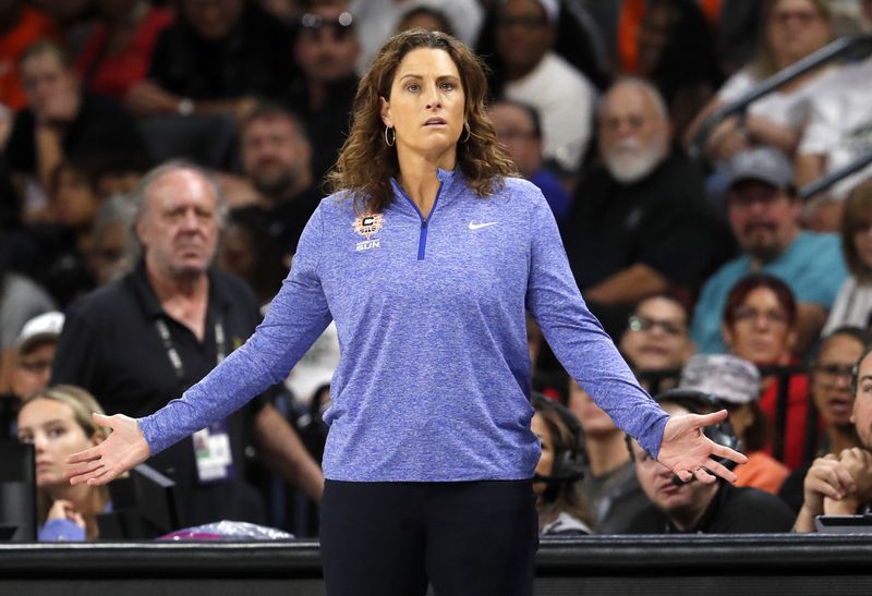 Connecticut Sun head coach Stephanie White reacts during the first half of an WNBA basketball game against the Las Vegas Aces, Sunday, Sept. 15, 2024, in Las Vegas. (Steve Marcus/Las Vegas Sun via AP)