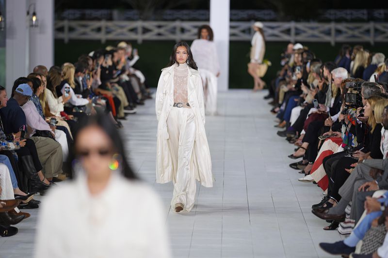 Models walk the runway during the Ralph Lauren Spring/Summer 2025 fashion show as part of New York Fashion Week on Thursday, Sept. 5, 2024, at Khalily Stables in Bridgehampton, N.Y. (Photo by Charles Sykes/Invision/AP)