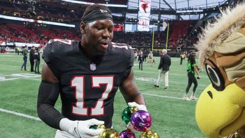 Atlanta Falcons linebacker Arnold Ebiketie (17) celebrates after winning a NFL football game between the Atlanta Falcons and the New Orleans Saints 24-15 in Atlanta on Sunday, Nov. 26, 2023.   (Bob Andres for the Atlanta Journal Constitution)