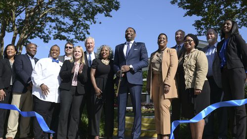 Atlanta Mayor Andre Dickens at a ribbon cutting ceremony for the grand reopening of the Villages of East Lake in Atlanta on Monday, May 9, 2022. (Natrice Miller / natrice.miller@ajc.com)