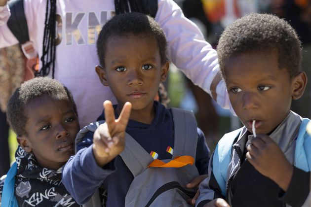 Children attend a back to school health fair in Milwaukee, on Saturday Aug. 10, 2024. (AP Photo/Jeffrey Phelps)