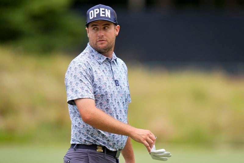 Colin Prater watches his putt on the first hole during a practice round for the U.S. Open golf tournament Wednesday, June 12, 2024, in Pinehurst, N.C. (AP Photo/Frank Franklin II)