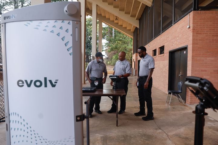 Analysts with the DeKalb County Safe Schools program operate the Evolv weapons detection system at Adams Stadium on Thursday, Aug. 15, 2024. The system has already been implemented in many DeKalb schools and will be expanding to football stadiums. (Natrice Miller/ AJC)