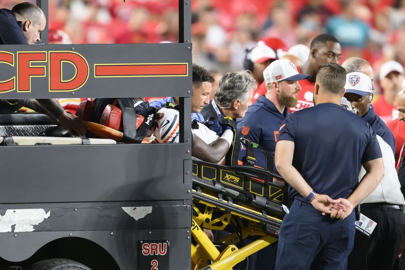 Chicago Bears safety Douglas Coleman III is loaded onto a cart to be taken off the field after being injured during the second half of a preseason NFL football game against the Kansas City Chiefs, Thursday, Aug. 22, 2024 in Kansas City, Mo. (AP Photo/Reed Hoffmann)