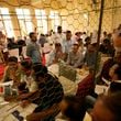 Election officers count votes for the recent election at a counting center in Jammu, India, Tuesday, Oct. 8, 2024. (AP Photo/Channi Anand)