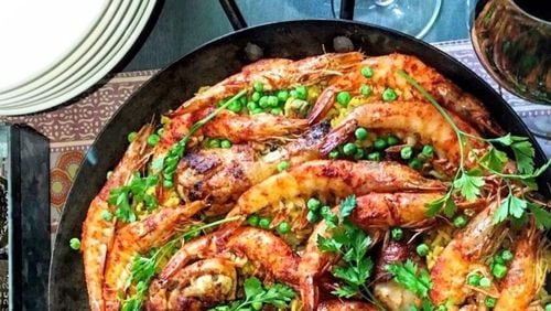 Though you can find a wonderful plate of paella in Spain, you also can create that magic at home by making Catalan Shrimp and Chicken Paella. CONTRIBUTED BY ASHA GOMEZ