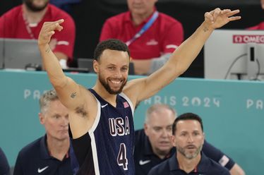 United States' Stephen Curry (4) reacts during a men's gold medal basketball game at Bercy Arena at the 2024 Summer Olympics, Saturday, Aug. 10, 2024, in Paris, France. (AP Photo/Michael Conroy)