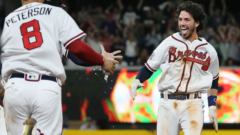 Heartwarming Moment: Freddie Freeman Embracing Dansby Swanson