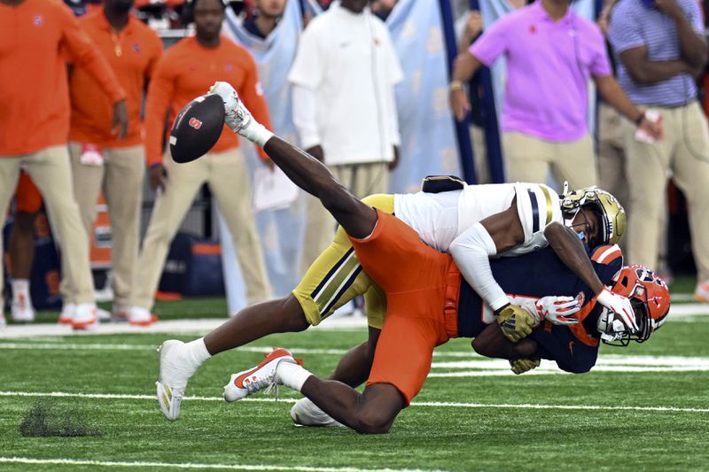 Georgia Tech defensive back Ahmari Harvey, top, breaks up a pass intended for Syracuse wide receiver Zeed Haynes during the first half of an NCAA football game on Saturday, Sept. 7, 2024 in Syracuse, N.Y. (AP Photo/Hans Pennink)