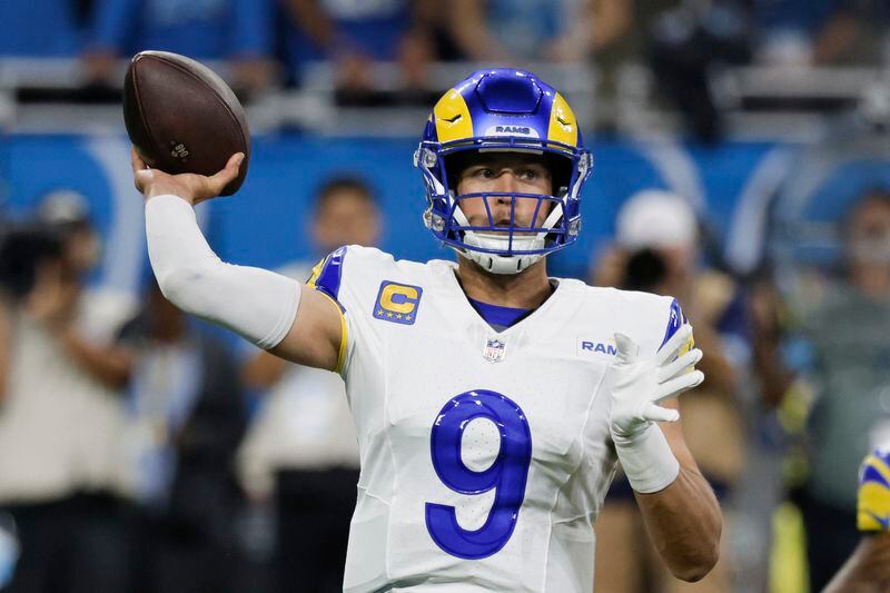 Los Angeles Rams quarterback Matthew Stafford (9) throws against the Detroit Lions during the first half of an NFL football game in Detroit, Sunday, Sept. 8, 2024. (AP Photo/Duane Burleson)