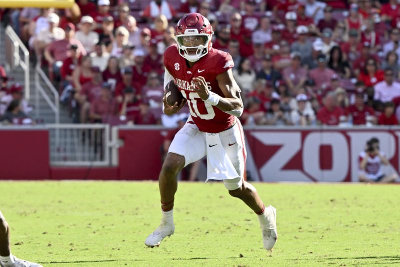 Arkansas quarterback Taylen Green (10) runs the ball against UAB during the first half of an NCAA college football game, Saturday, Sept. 14, 2024, in Fayetteville, Ark. (AP Photo/Michael Woods)