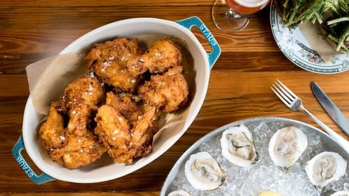 Mary Hoopa's House of Fried Chicken and Oysters whole house fried chicken and raw Oysters. Photo credit- Mia Yakel.