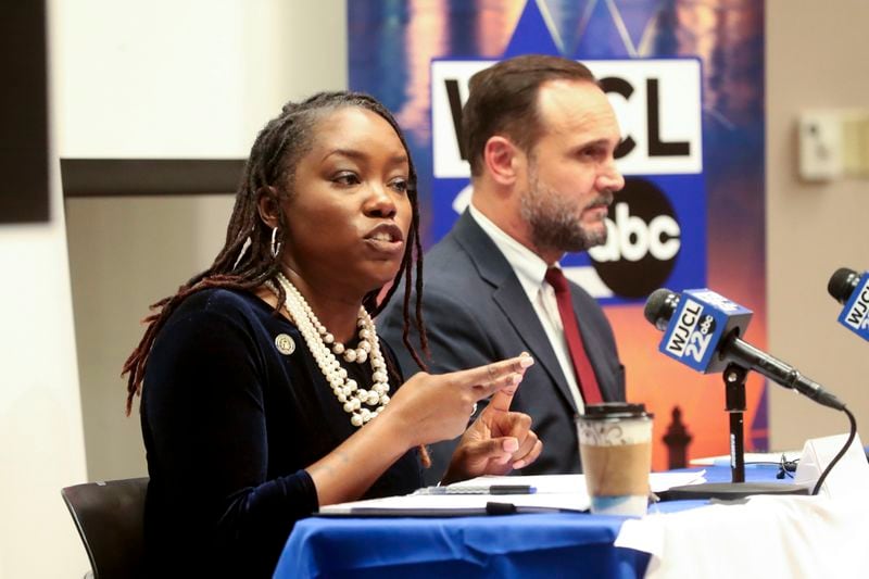 District Attorney Shalena Cook Jones, left, responds to a question during the League of Women Voters of Coastal Georgia candidate forum with Republican challenger Andre Pretorius on Monday, Sept. 16, 2024, at the Coastal Georgia Center in Savannah, Ga. (Richard Burkhart/Savannah Morning News via AP)