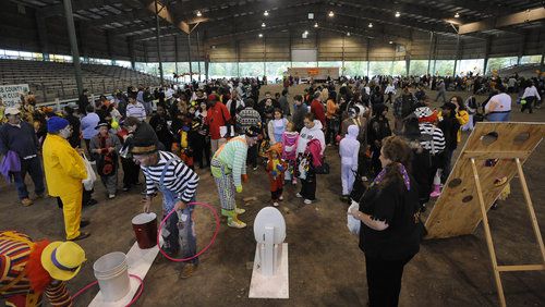 Volunteers from Shrine Circus entertain during the Fall Festival of Fun event Saturday.
