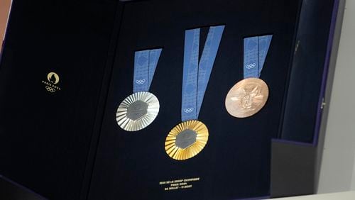 FILE - The medals for the Paris 2024 Olympic are displayed at the Paris Olympic organizers in Saint-Denis, outside Paris, Feb. 8, 2024. (AP Photo/Thibault Camus, File)
