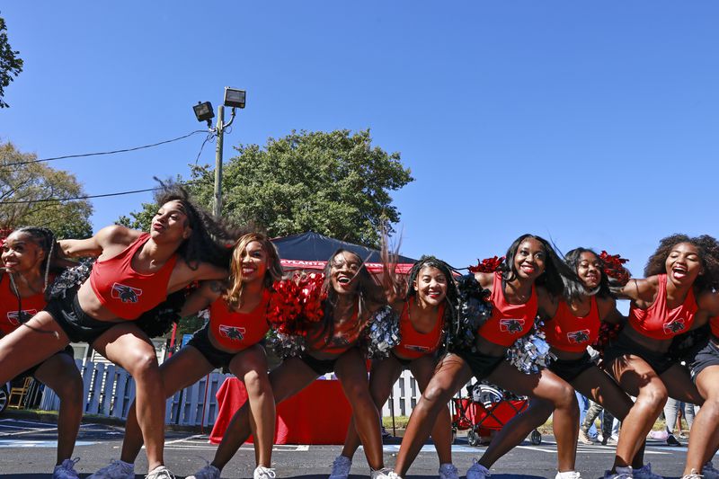 Clark Atlanta University cheerleaders do the “swag surf” dance during a homecoming pep rally on Friday, October 14, 2022. (Natrice Miller/natrice.miller@ajc.com)  