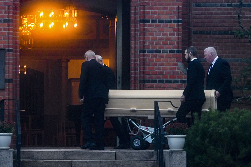 A coffin of football legend Sven-Goran Eriksson is carried into Fryksande church in Torsby, Sweden, Friday, Sept. 13, 2024. (Jonas Ekströmer/TT News Agency via AP)