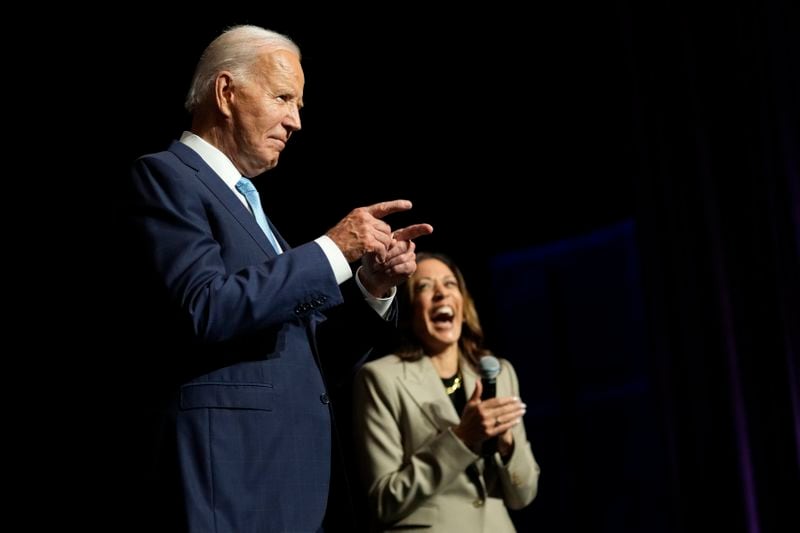 President Joe Biden gestures to the crowd as he speaks alongside Democratic presidential nominee Vice President Kamala Harris about the administration's efforts to lower prescription drug costs during an event at Prince George's Community College in Largo, Md., Thursday, Aug. 15, 2024. (AP Photo/Susan Walsh)