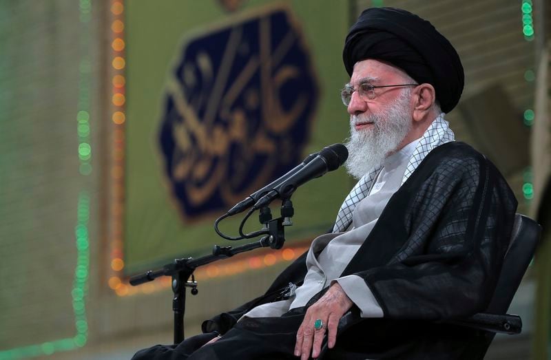 In this photo released by an official website of the office of the Iranian supreme leader, Supreme Leader Ayatollah Ali Khamenei sits in a ceremony to mark the Shiite holiday of Eid al-Ghadir, in Tehran, Iran, Tuesday, June 25, 2024. Khamenei called Tuesday for "maximum" voter turnout in this week's presidential election to "overcome the enemy," denouncing politicians who he described as believing that everything good comes from the United States. (Office of the Iranian Supreme Leader via AP)