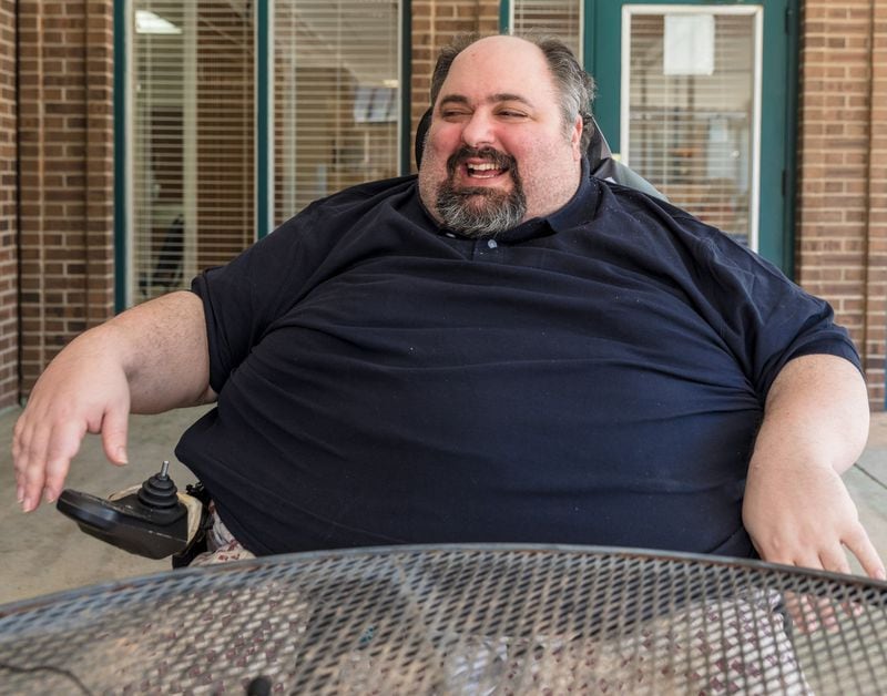 Nick Papadopoulos has cerebral palsy, which has led to severe arthritis and obesity. He wants to move out of his nursing facility, but the state keeps denying his request for a waiver. CONTRIBUTED
