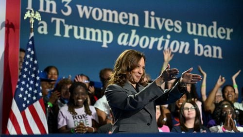 Vice President Kamala Harris takes the stage before she makes a speech to address abortion rights during a campaign stop at the Cobb Energy Performing Arts Centre, Friday, September 20, 2024, in metro Atlanta. The Democratic presidential nominee made a speech to address abortion rights after a ProPublica report linked the deaths of two Georgia women to the state’s GOP-backed policies. (Hyosub Shin / AJC)