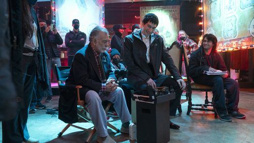 This image released by Lionsgate shows writer/director Francis Ford Coppola, left, and actor Adam Driver on the set of "Megalopolis." (Phil Caruso/Lionsgate via AP)