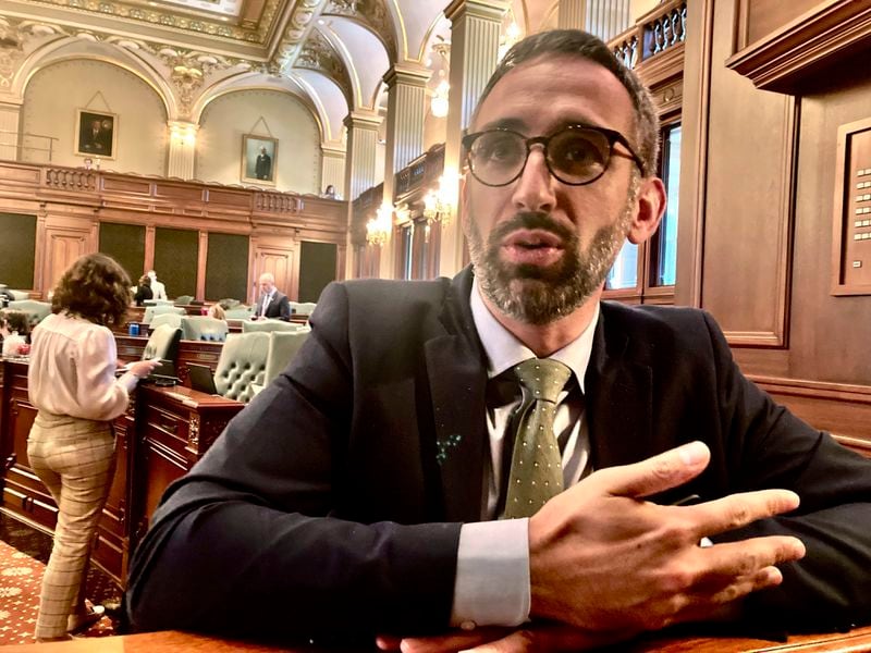 FILE - Illinois state Rep. Will Guzzardi, D-Chicago, speaks to a reporter on the floor of the Illinois House, in Springfield, Ill., May 11, 2023. The Illinois General Assembly is poised to right a 175-year-old wrong by returning land in northern Illinois guaranteed to a Potawatomi chief in 1829. (AP Photo/John O'Connor, file)