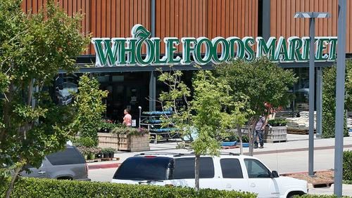 Whole Foods Market discriminated against its employees when it barred them from wearing Black Lives Matter face coverings while on the job, according to a federal lawsuit filed Monday in Boston. (File/AP Photo/Sue Ogrocki)