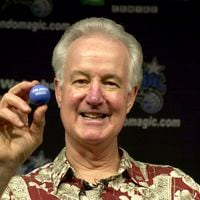 FILE - Orlando Magic senior vice president Pat Williams chats with media about the upcoming NBA draft, May 21, 2004 in Orlando, Fla. Williams, a co-founder of the Orlando Magic and someone who spent more than a half-century working within the NBA, died Wednesday, July 17, 2024, from complications related to viral pneumonia, the team announced. (AP Photo/Peter Cosgrove, File)