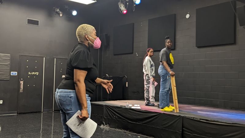 Playwright Nikki Toombs (left) leads a rehearsal at Martha Ellen Stilwell School of the Arts in Jonesboro. Toombs, who wrote a musical "Courageous Steps" commemorating school desegregation, says that America hasn’t yet fulfilled the goal of Thurgood Marshall, the lead attorney in the 1954 Brown case. (Courtesy of Larsen Kennedy)