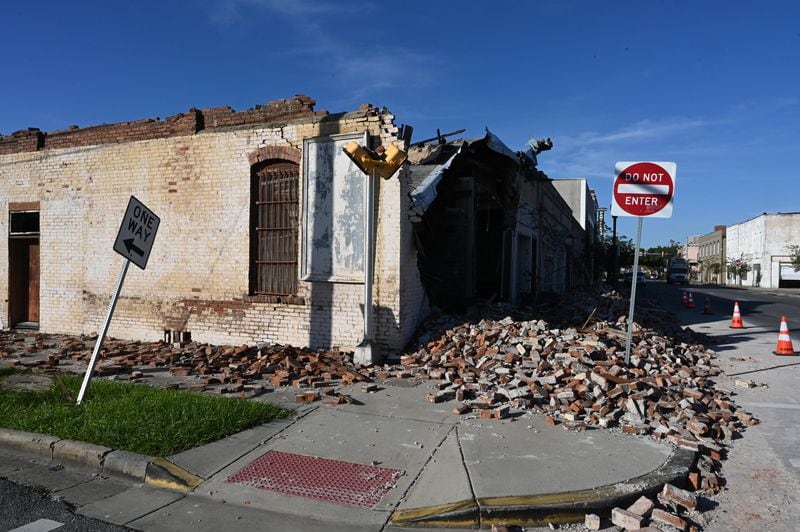 Hurricane Helene destroyed many buildings in downtown Valdosta, Saturday, September 28, 2024. The devastation in Valdosta was extensive after the South Georgia city was battered with hurricane-force winds on Helene’s path across the state. Damaging Helene has swept through Georgia, leading to at least 17 deaths. All 159 counties are now assessing the devastation and working to rebuild, even as serious flooding risks linger. (Hyosub Shin / AJC)